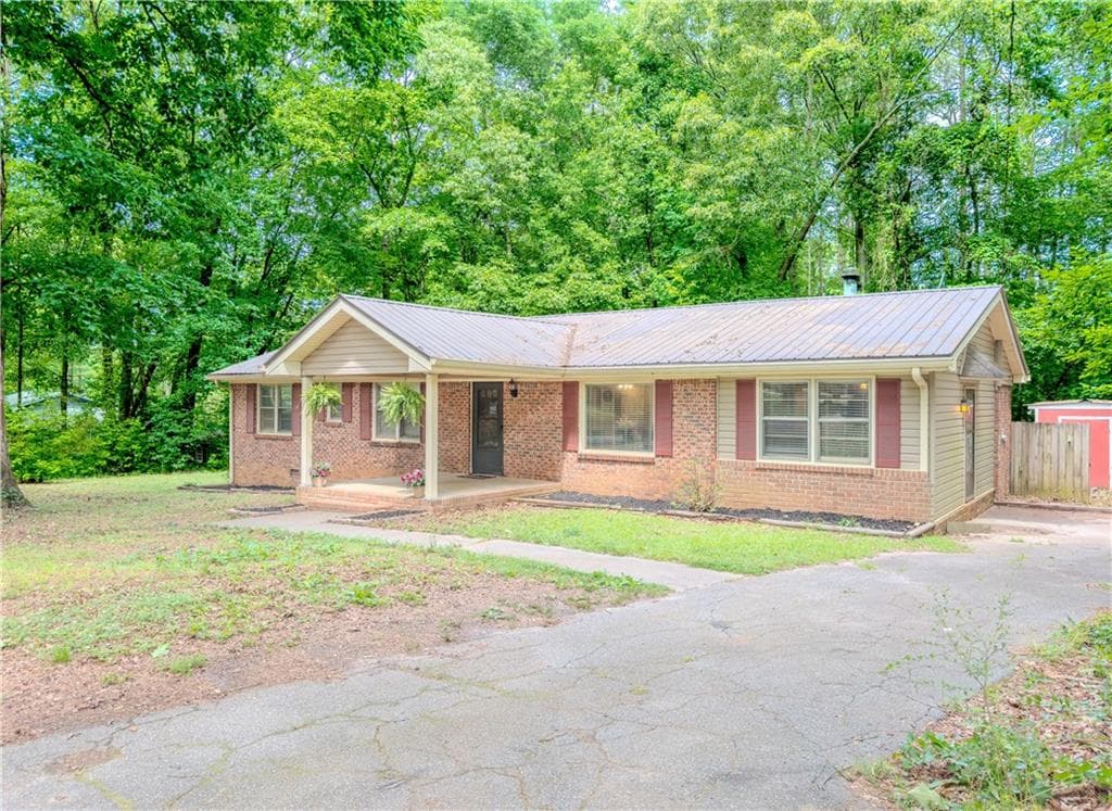 4 bedroom, 2 bathroom, 1,701 sq ft single family residence sold at 1648 Dogwood Trail, Monroe, GA 30655