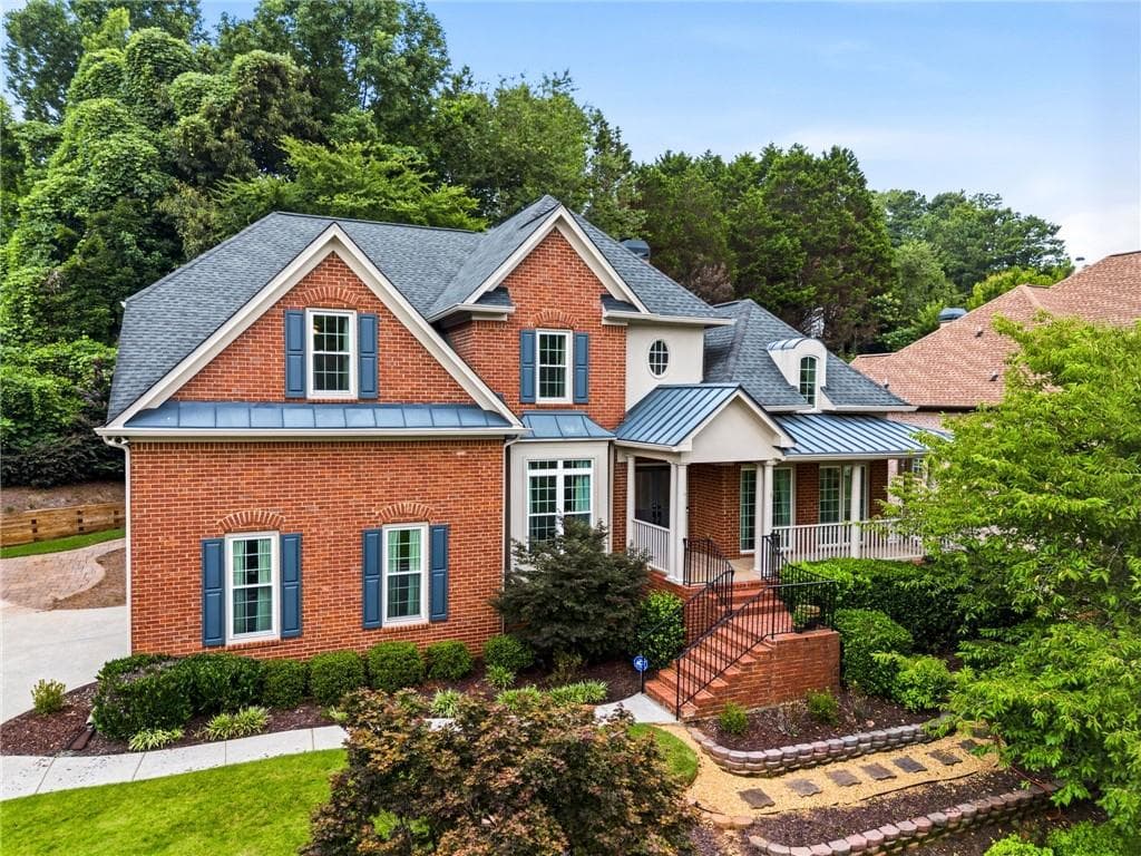 6 bedroom, 5 bathroom, 5,252 sq ft single family residence sold at 11415 Donnington Drive, Johns Creek, GA 30097