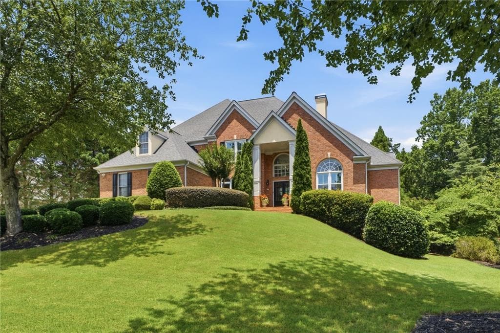 5 bedroom, 4 bathroom, 4,058 sq ft single family residence sold at 2455 Flat Stone Drive, Cumming, GA 30041