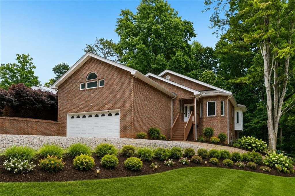 4 bedroom, 3 bathroom, 4,458 sq ft single family residence sold at 6137 White Oak Drive, Flowery Branch, GA 30542