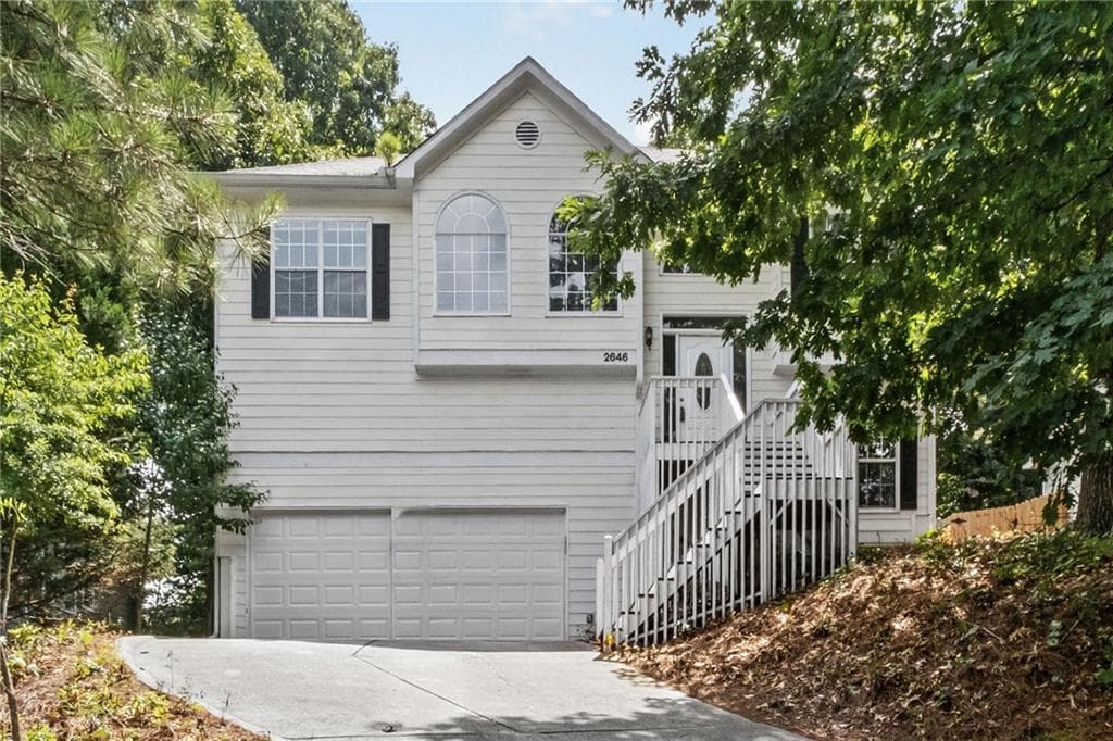 4 bedroom, 3 bathroom, 2,420 sq ft single family residence for sale at 2646 Mcguire Drive, Kennesaw, GA 30144