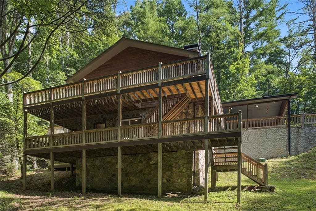 5 bedroom, 3 bathroom, 3,920 sq ft single family residence sold at 35 Laurel Ridge Drive, Ellijay, GA 30536