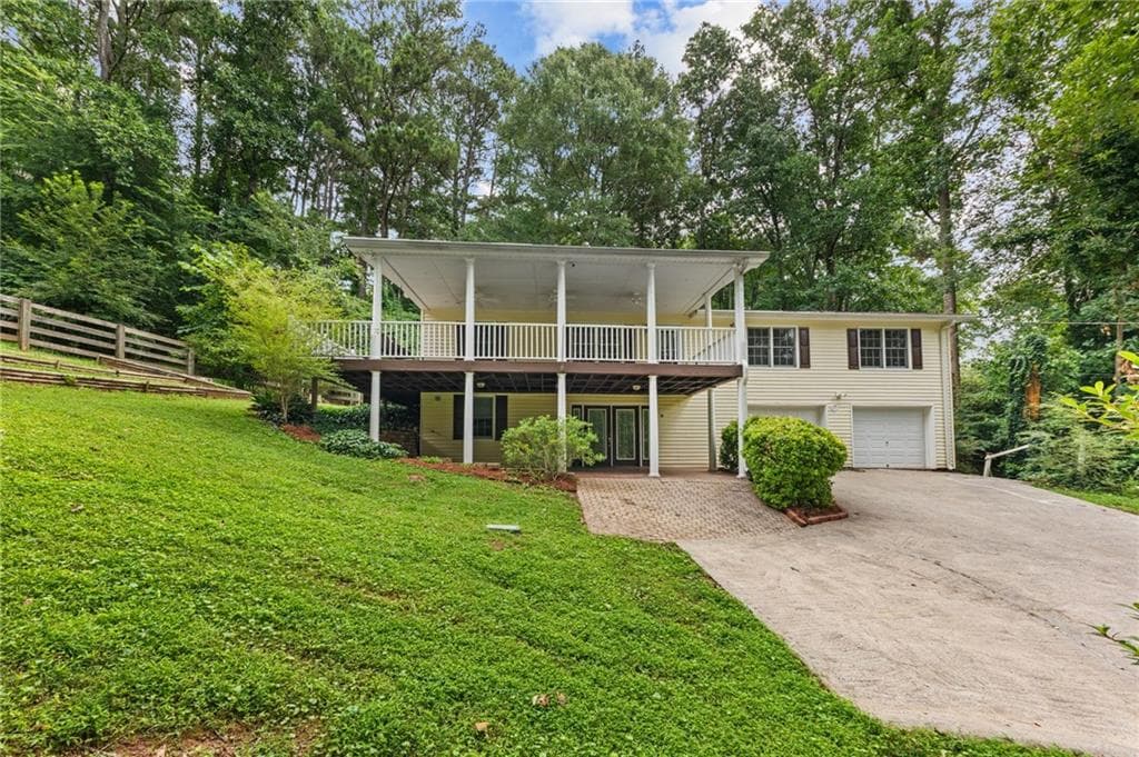 4 bedroom, 2 bathroom, 2,088 sq ft single family residence for sale at 702 Osco Parkway, Woodstock, GA 30188