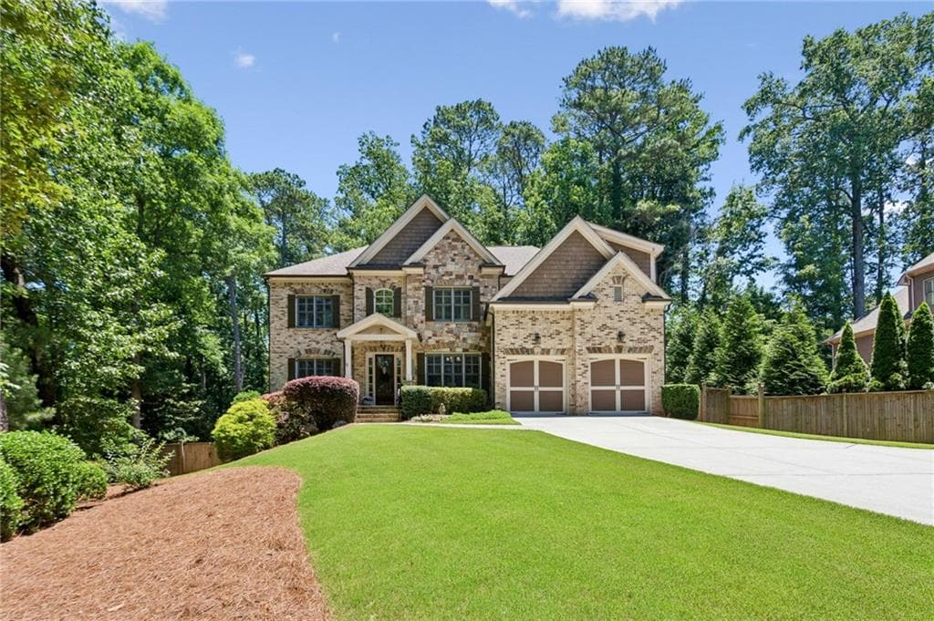 6 bedroom, 5 bathroom, 6,003 sq ft single family residence sold at 4311 Oak Forest Way, Atlanta, GA 30319
