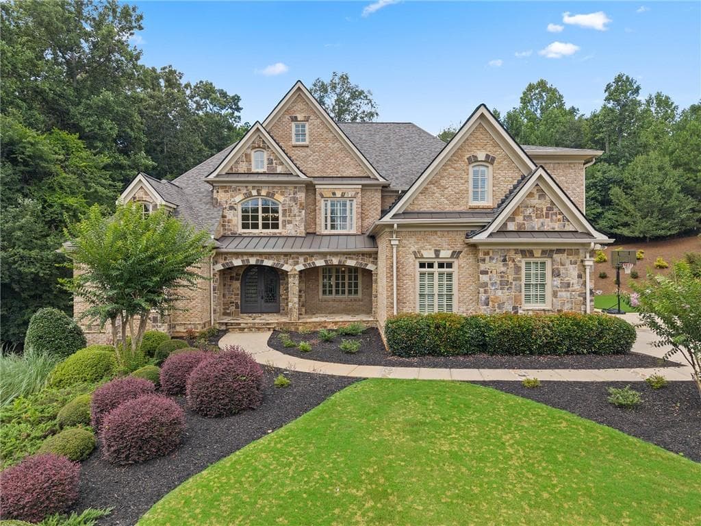 6 bedroom, 7 bathroom, 8,518 sq ft single family residence sold at 210 Manor Close, Milton, GA 30004