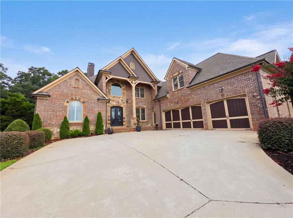 4 bedroom, 5 bathroom, 6,752 sq ft single family residence for sale at 2711 Wildflower Way, Hoschton, GA 30548