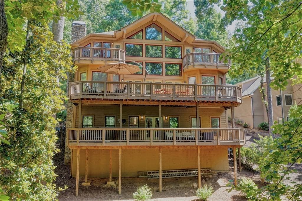 4 bedroom, 5 bathroom, 3,884 sq ft single family residence for sale at 9035 Walnut Cove Lane, Gainesville, GA 30506