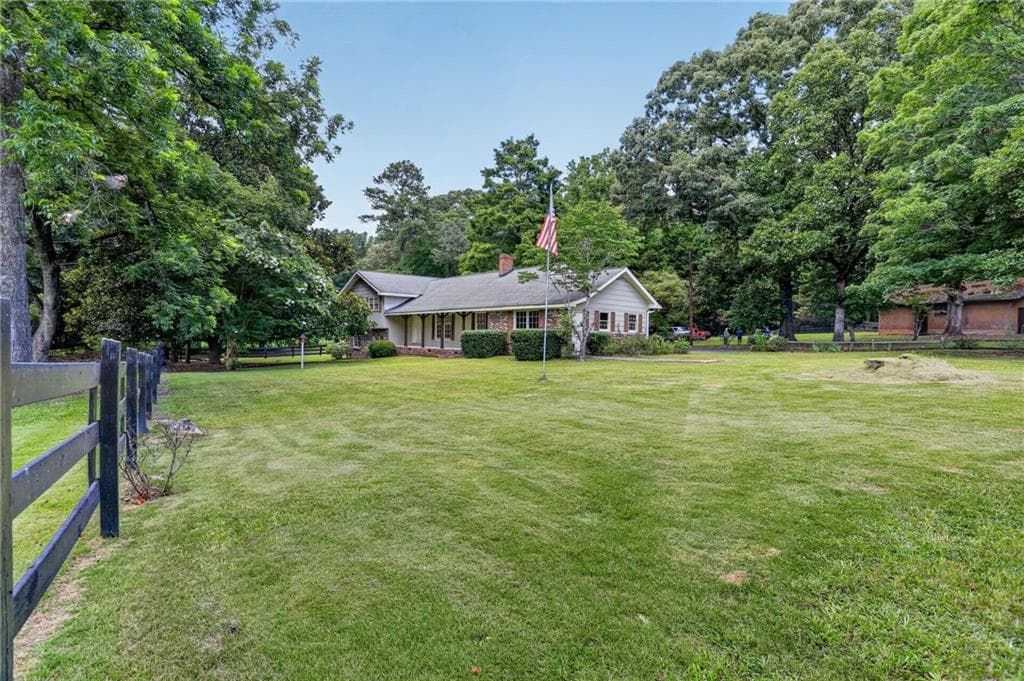 4 bedroom, 3 bathroom, 1,889 sq ft single family residence for sale at 3333 Jonesboro Road, South Fulton, GA 30213