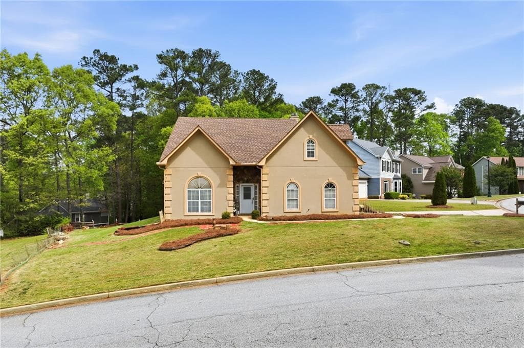 3 bedroom, 3 bathroom, 2,016 sq ft single family residence for sale at 1787 Wedgewood Drive, Stone Mountain, GA 30088