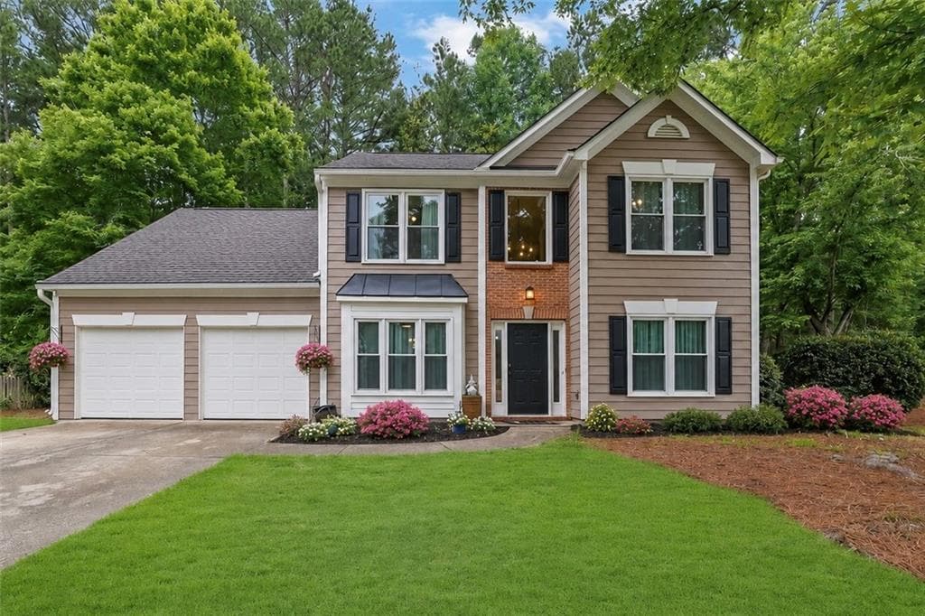 4 bedroom, 3 bathroom, 2,394 sq ft single family residence for sale at 8011 Huntcliff Road, Woodstock, GA 30189