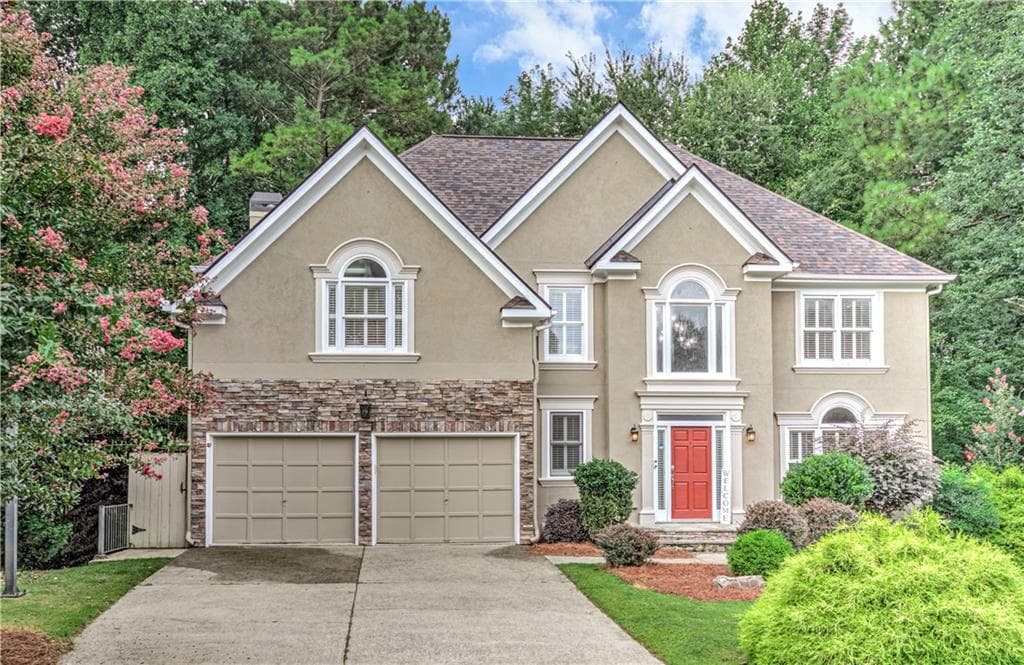 5 bedroom, 5 bathroom, 3,880 sq ft single family residence for sale at 409 Misty Ridge Way, Woodstock, GA 30189
