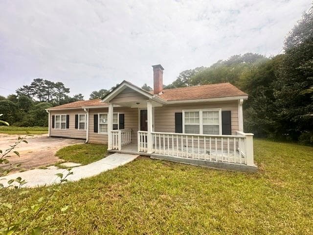 3 bedroom, 2 bathroom, 1,484 sq ft single family residence for sale at 10453 Flat Shoals Road, Covington, GA 30014