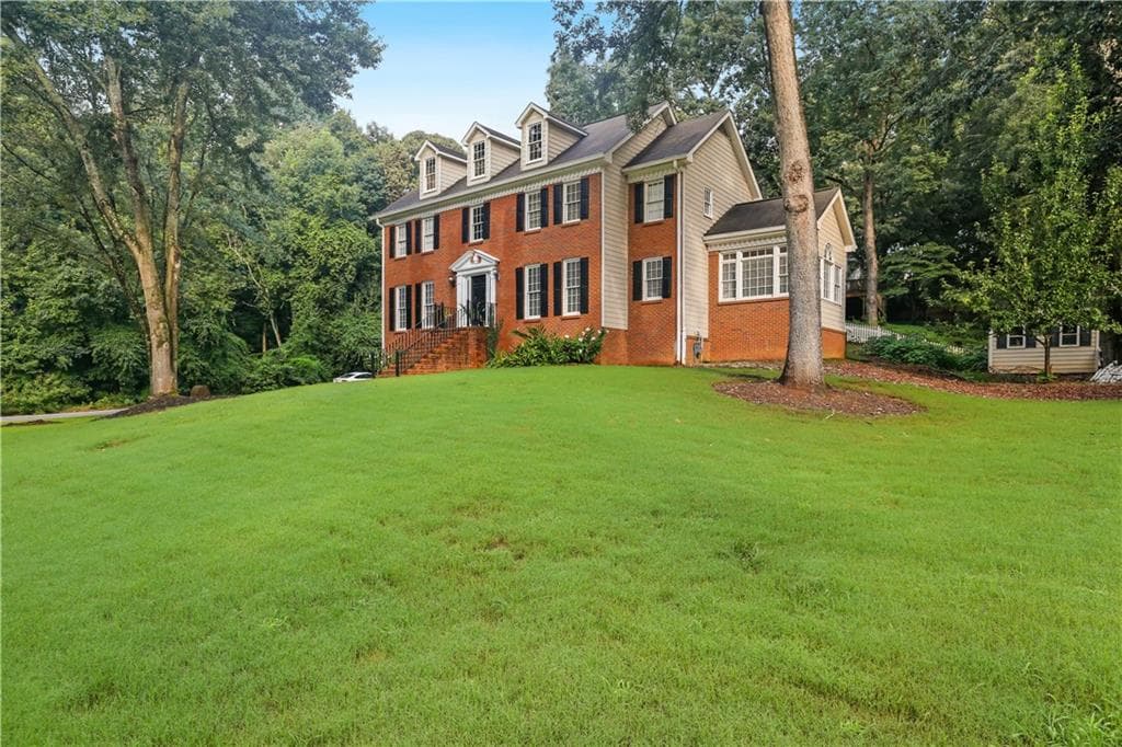 4 bedroom, 3 bathroom, 2,484 sq ft single family residence for sale at 1575 Thoreau Drive, Suwanee, GA 30024