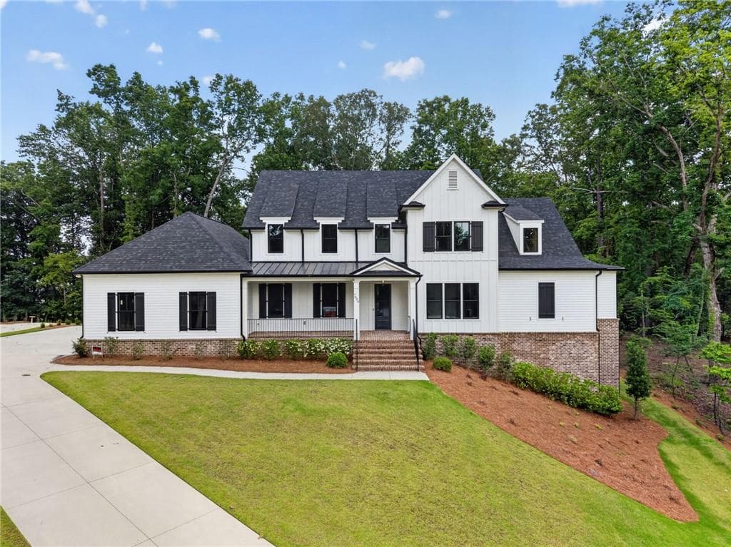 4 bedroom, 6 bathroom, 5,800 sq ft single family residence for sale at 7620 Breeze Bay Road, Cumming, GA 30041