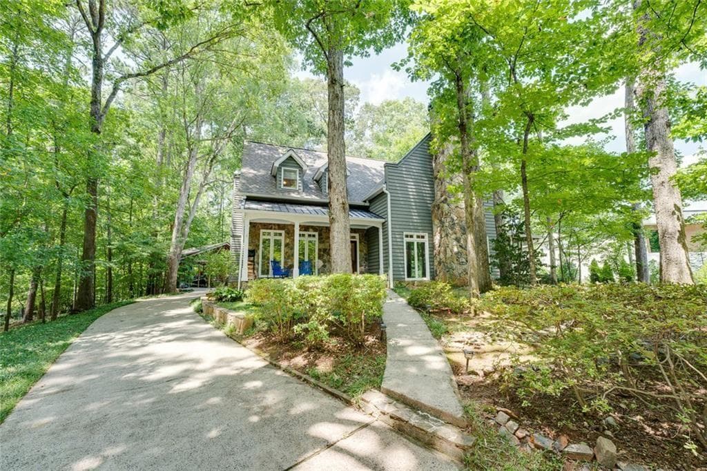4 bedroom, 5 bathroom, 5,341 sq ft single family residence sold at 50 Serendipity Way, Sandy Springs, GA 30350