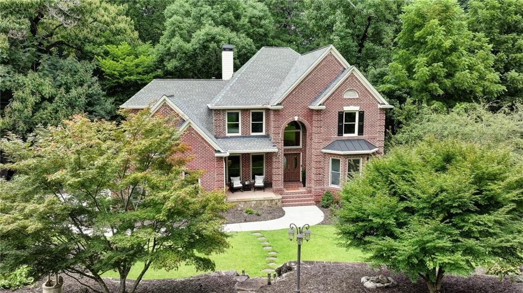 7 bedroom, 6 bathroom, 6,446 sq ft single family residence for sale at 2436 Fontainebleau Drive, Atlanta, GA 30360