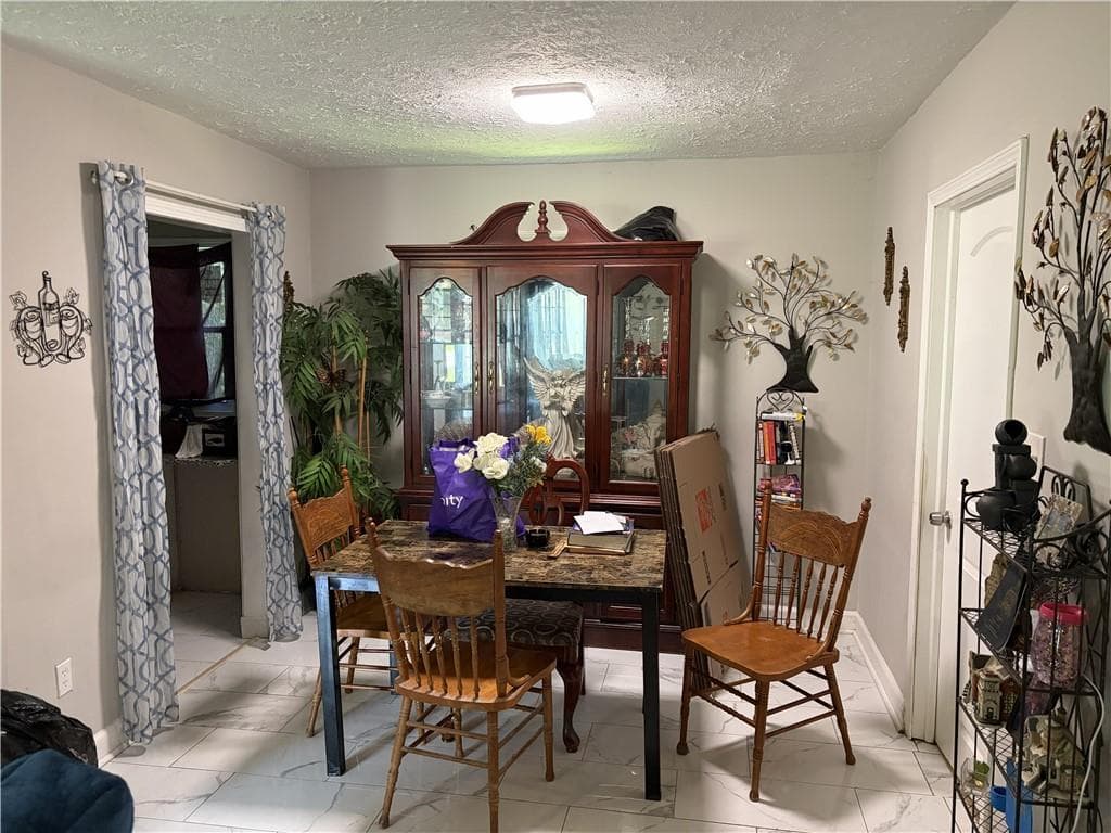 4 bedroom, 2 bathroom, 1,144 sq ft single family residence for sale at 2680 Wiggins Street, Lithonia, GA 30058