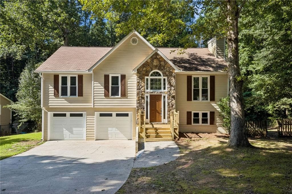 4 bedroom, 3 bathroom, 2,002 sq ft single family residence for sale at 7060 Old Post Court, Cumming, GA 30028