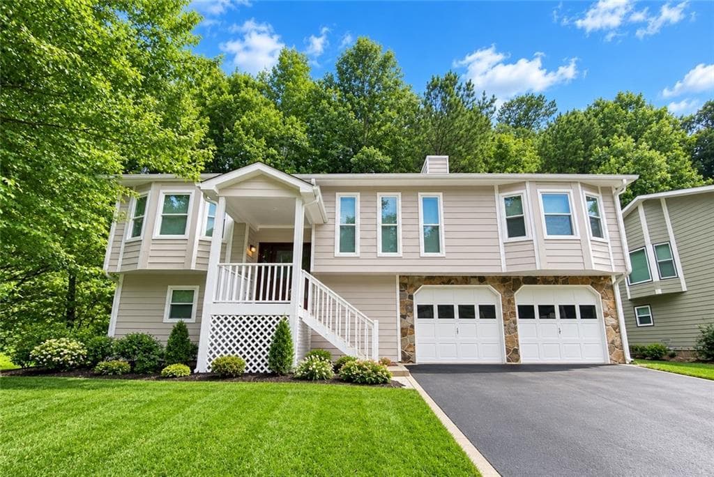 5 bedroom, 3 bathroom, 1,236 sq ft single family residence for sale at 1326 Williamsburg Lane, Norcross, GA 30093