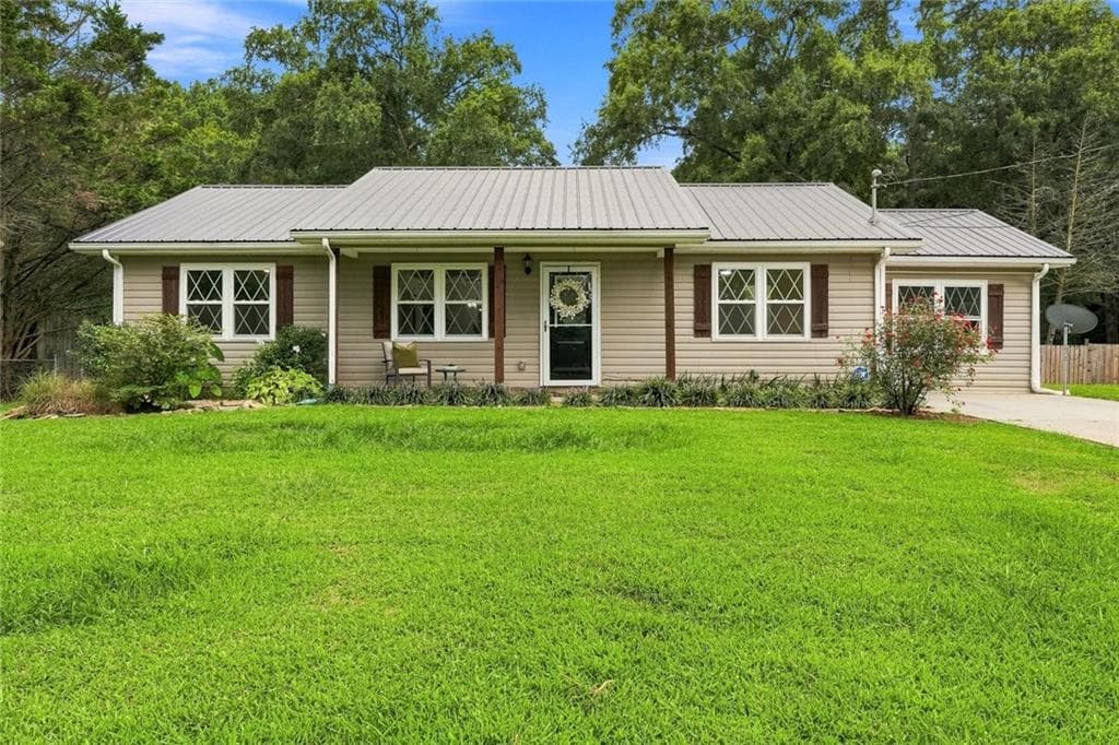4 bedroom, 2 bathroom, 1,356 sq ft single family residence for sale at 1015 Erwin Hill Church Road, Calhoun, GA 30701