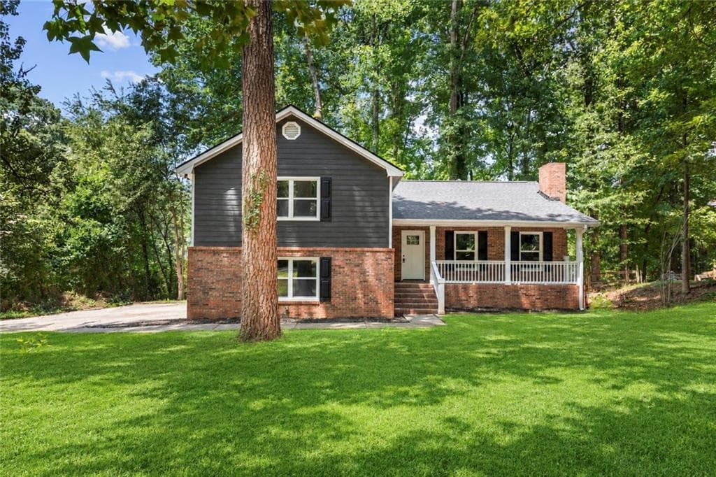 4 bedroom, 3 bathroom, 2,002 sq ft single family residence for sale at 4891 Lake Forest Drive, Conyers, GA 30094