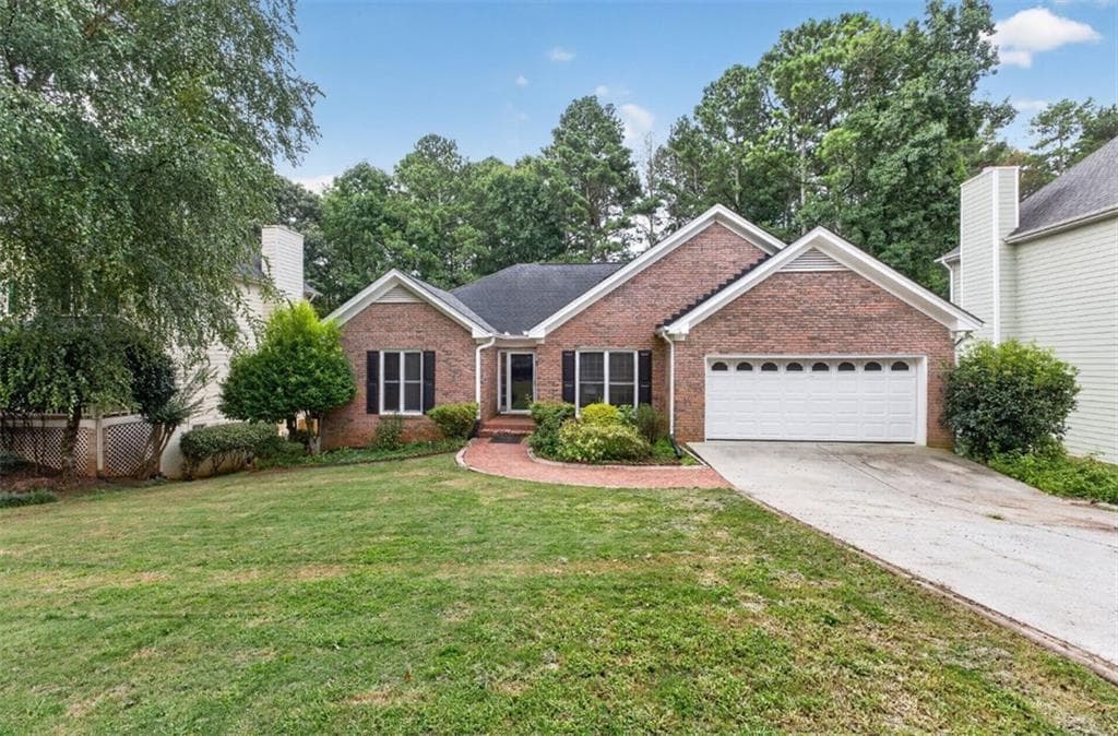 4 bedroom, 3 bathroom, 3,656 sq ft single family residence for sale at 1105 Secret Cove Drive, Buford, GA 30518
