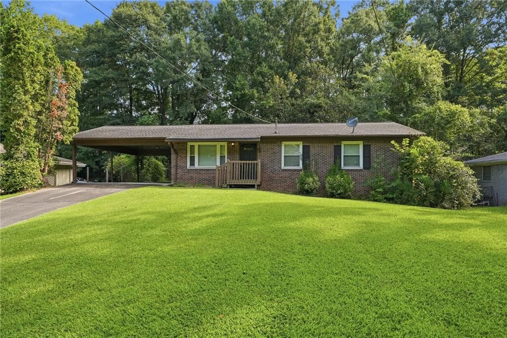 3 bedroom, 2 bathroom, 1,075 sq ft single family residence for sale at 928 Magna Carta Drive, Atlanta, GA 30318
