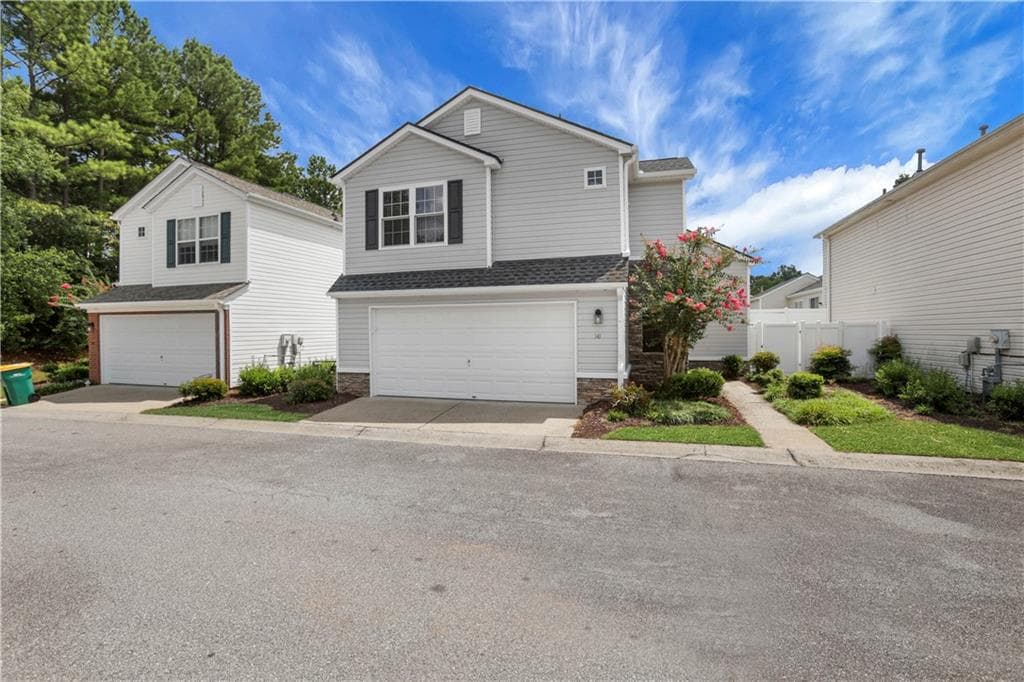 2 bedroom, 3 bathroom, 1,298 sq ft single family residence for sale at 141 W Oaks Place, Woodstock, GA 30188
