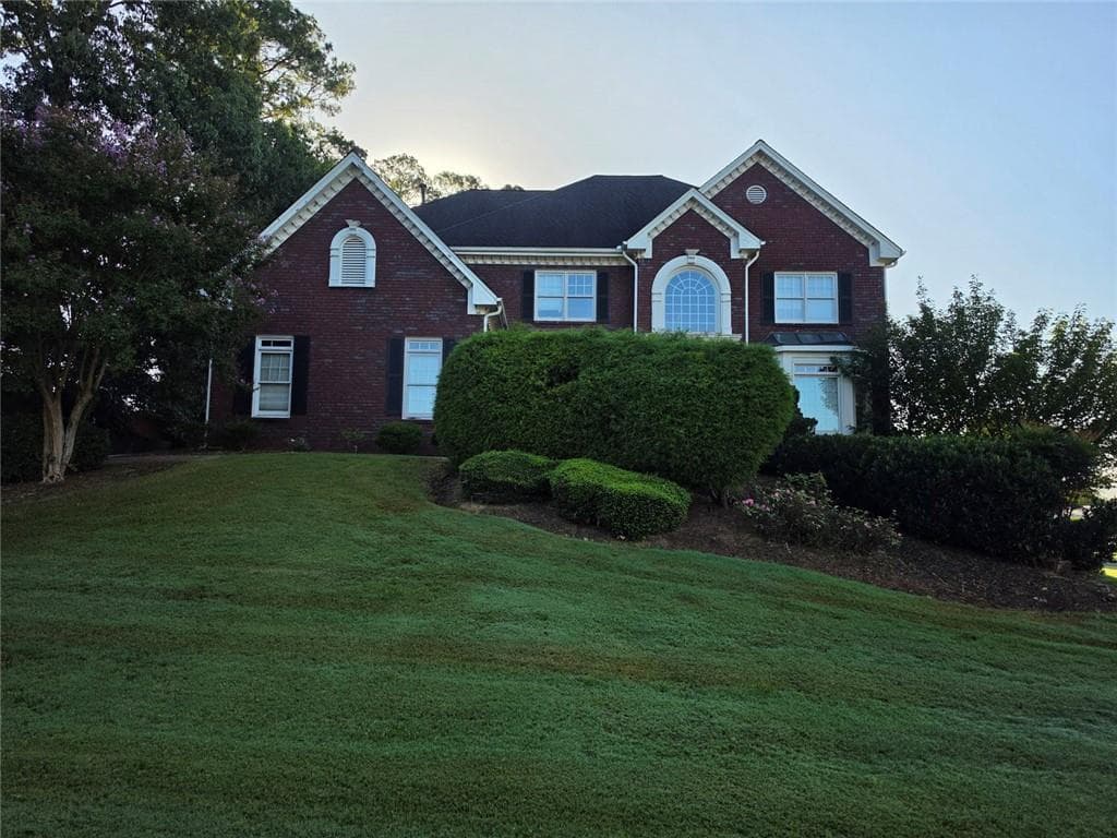 6 bedroom, 5 bathroom, 5,711 sq ft single family residence for sale at 2810 Shoemaker Lane, Snellville, GA 30039