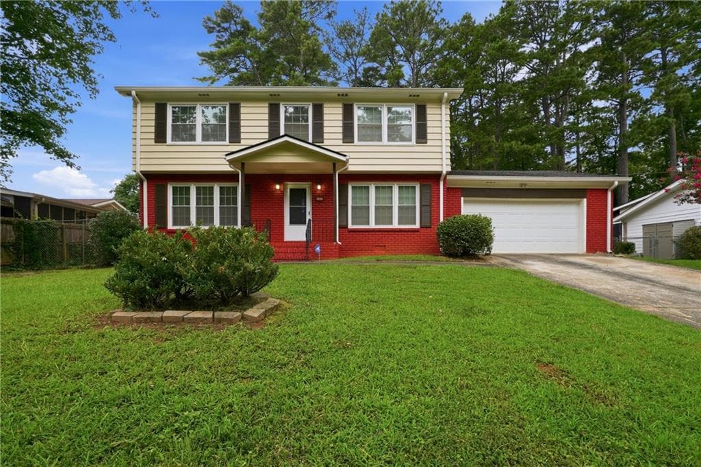 4 bedroom, 3 bathroom, 1,975 sq ft single family residence for sale at 1604 Drayton Woods Drive, Tucker, GA 30084