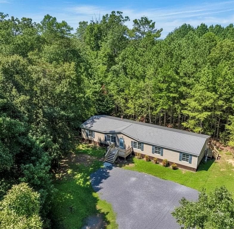 4 bedroom, 2 bathroom, 2,128 sq ft single family residence for sale at 827 Brackett Ridge Road, Chatsworth, GA 30705