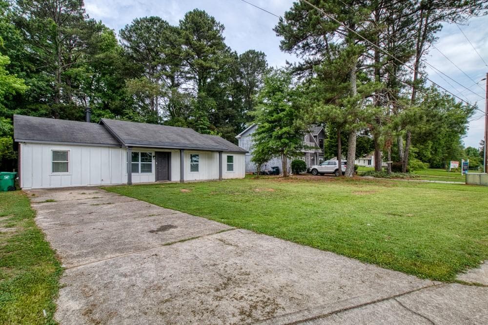 4 bedroom, 2 bathroom, 1,566 sq ft single family residence for sale at 1107 Panola Road, Stone Mountain, GA 30088
