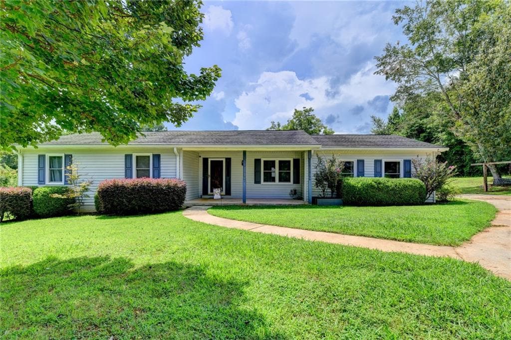 4 bedroom, 3 bathroom, 2,109 sq ft single family residence for sale at 4410 Meadow Trail, Cumming, GA 30028