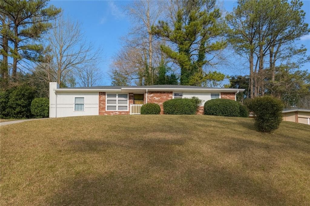 4 bedroom, 2 bathroom, 1,362 sq ft single family residence for sale at 70 Ruzelle Drive, Atlanta, GA 30354