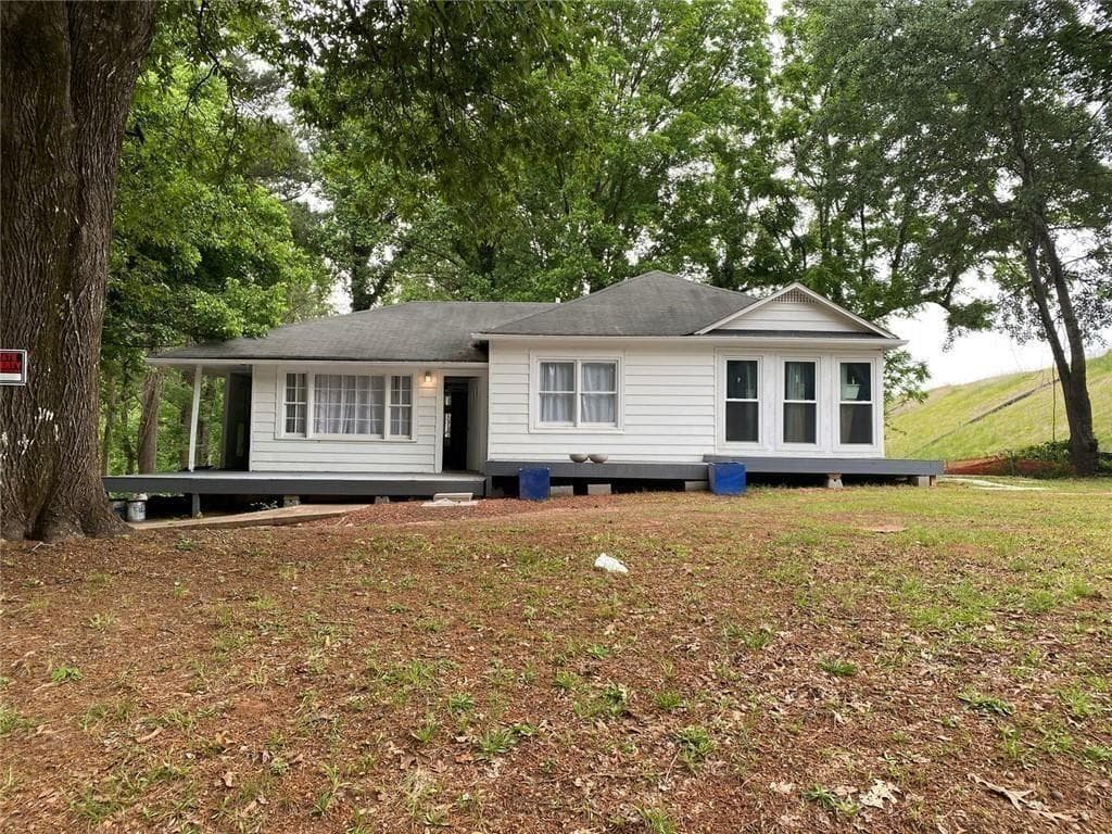 3 bedroom, 1 bathroom, 1,232 sq ft single family residence for sale at 4682 Stonewall Tell Road, Atlanta, GA 30349