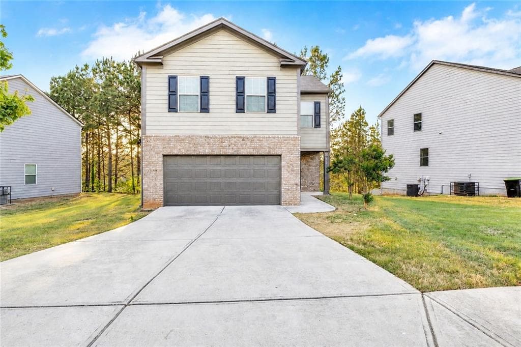 4 bedroom, 3 bathroom, 1,927 sq ft single family residence for sale at 418 Lake Ridge Lane, Fairburn, GA 30213