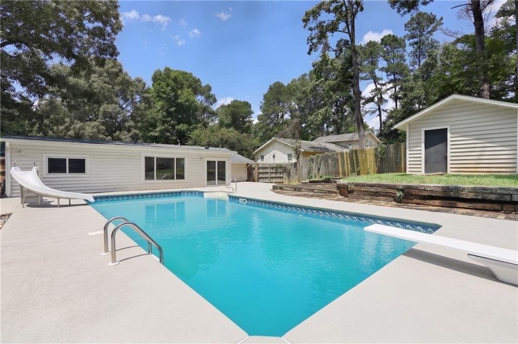 4 bedroom, 2 bathroom, 2,100 sq ft single family residence for sale at 3733 Memorial Parkway, Kennesaw, GA 30152