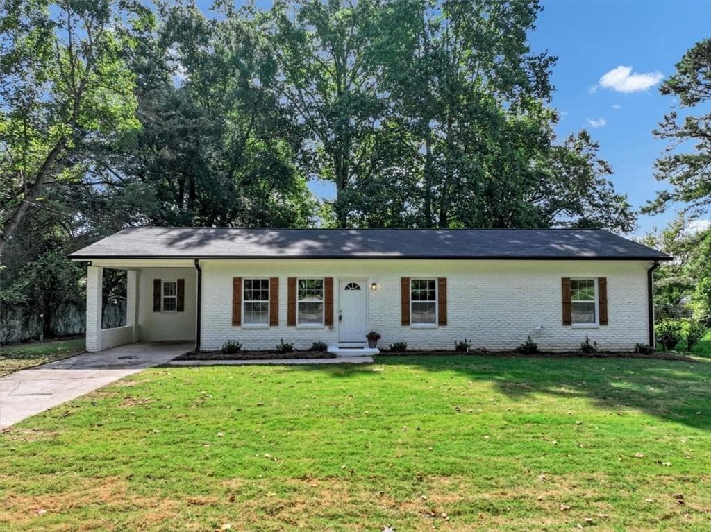 3 bedroom, 2 bathroom, 1,300 sq ft single family residence for sale at 5530 Old Bill Cook Road, Atlanta, GA 30349