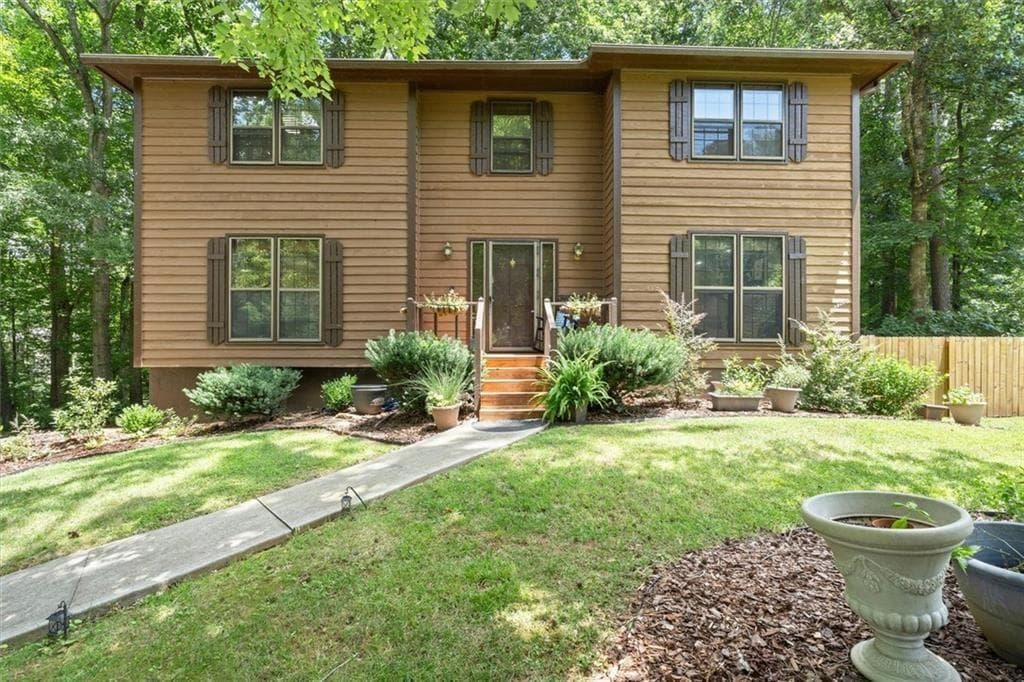 4 bedroom, 3 bathroom, 2,576 sq ft single family residence for sale at 3973 Guilford Court, Lilburn, GA 30047