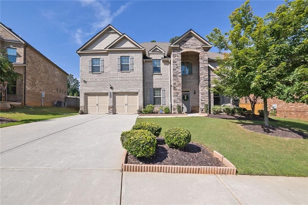 5 bedroom, 4 bathroom, 4,476 sq ft single family residence for sale at 4550 Point Rock Drive, Buford, GA 30519