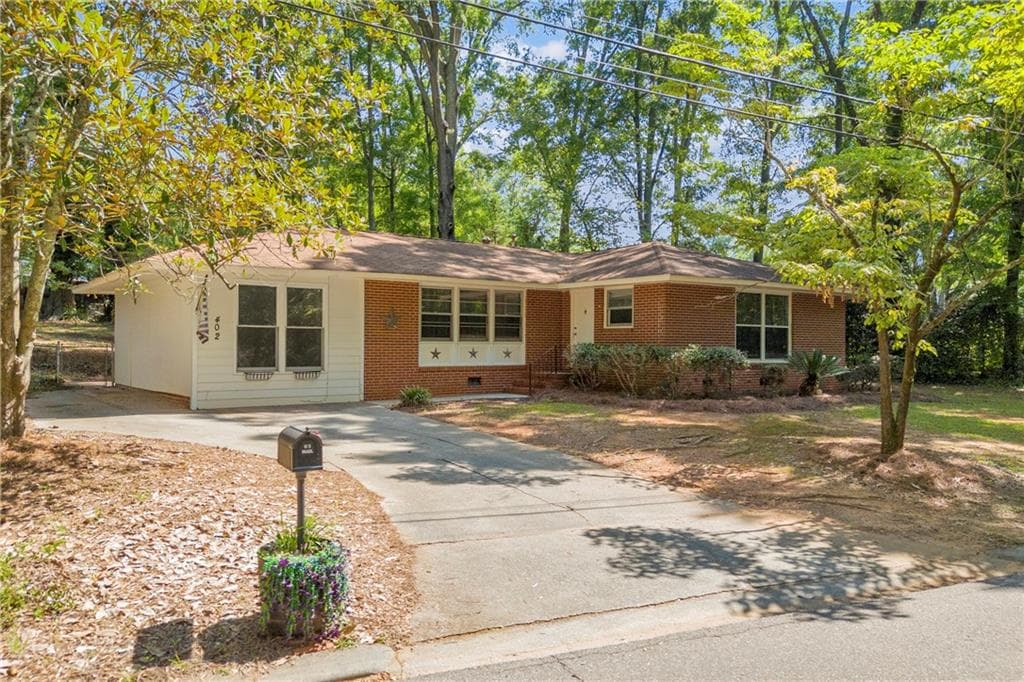 3 bedroom, 2 bathroom, 1,742 sq ft single family residence for sale at 402 Woodland Road, Monroe, GA 30655
