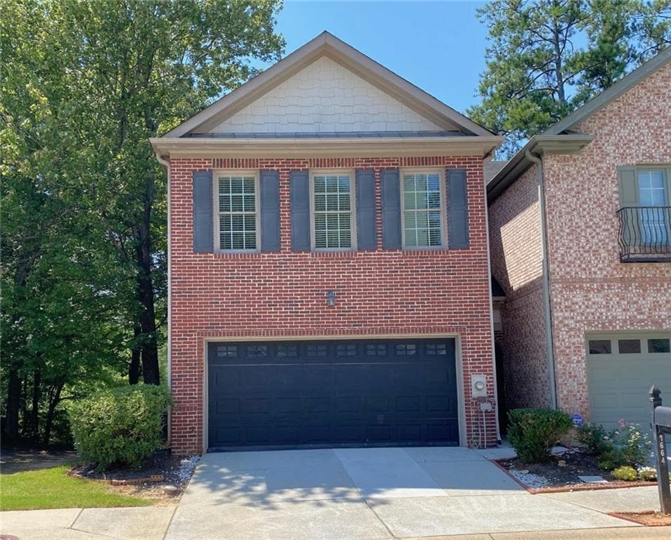 3 bedroom, 3 bathroom, 1,836 sq ft townhouse for sale at 1664 OAKBROOK LAKE Drive, Norcross, GA 30093