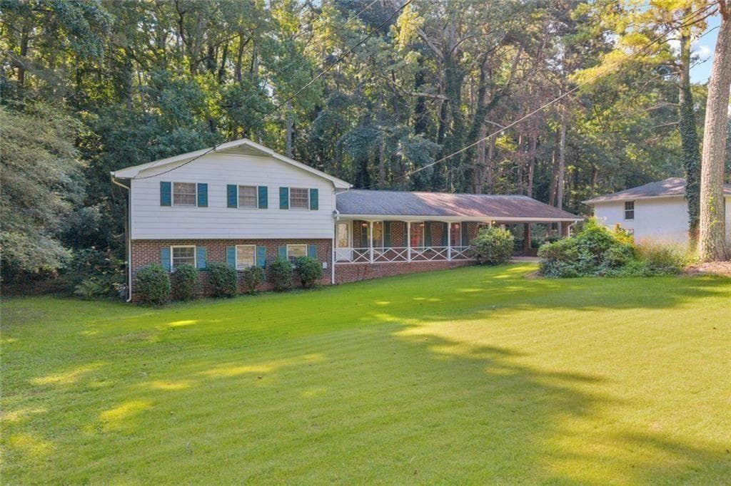 5 bedroom, 3 bathroom, 2,424 sq ft single family residence for sale at 5892 Button Gwinnett Place, Norcross, GA 30093