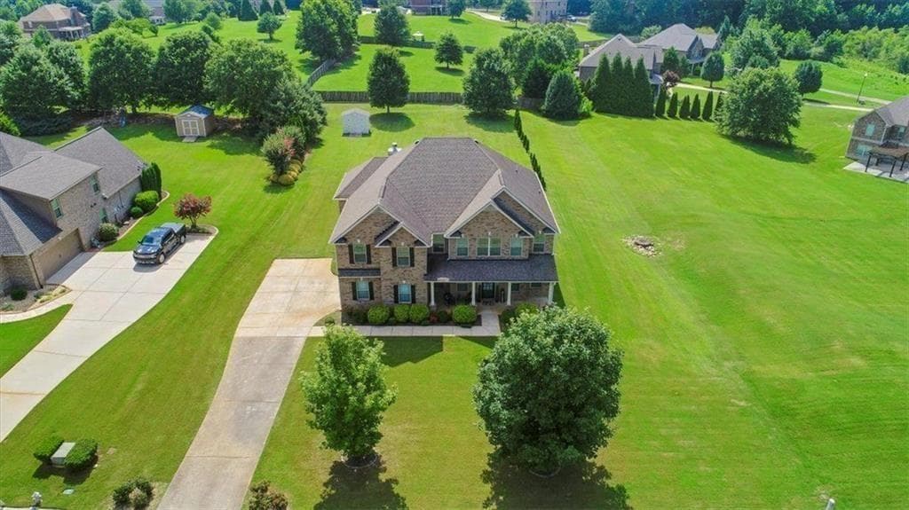 4 bedroom, 4 bathroom, 4,288 sq ft single family residence for sale at 213 Manresa Court, Hampton, GA 30228