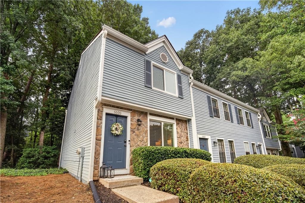 2 bedroom, 3 bathroom, 1,136 sq ft townhouse for sale at 6600 Autumn Trace Drive, Peachtree Corners, GA 30092