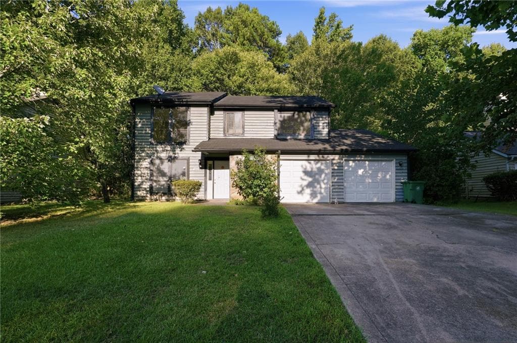 4 bedroom, 3 bathroom, 2,045 sq ft single family residence for sale at 1001 Chapman Lane, Stone Mountain, GA 30088