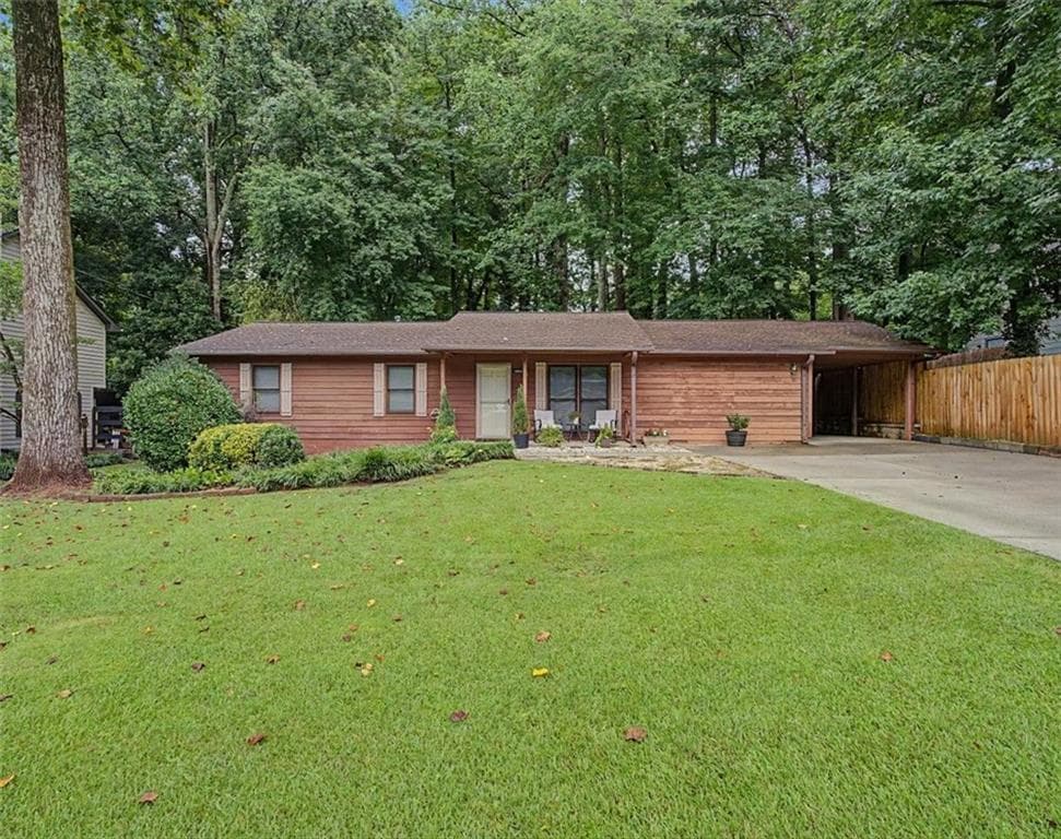4 bedroom, 2 bathroom, 1,456 sq ft single family residence sold at 3095 Woodland Drive, Kennesaw, GA 30152