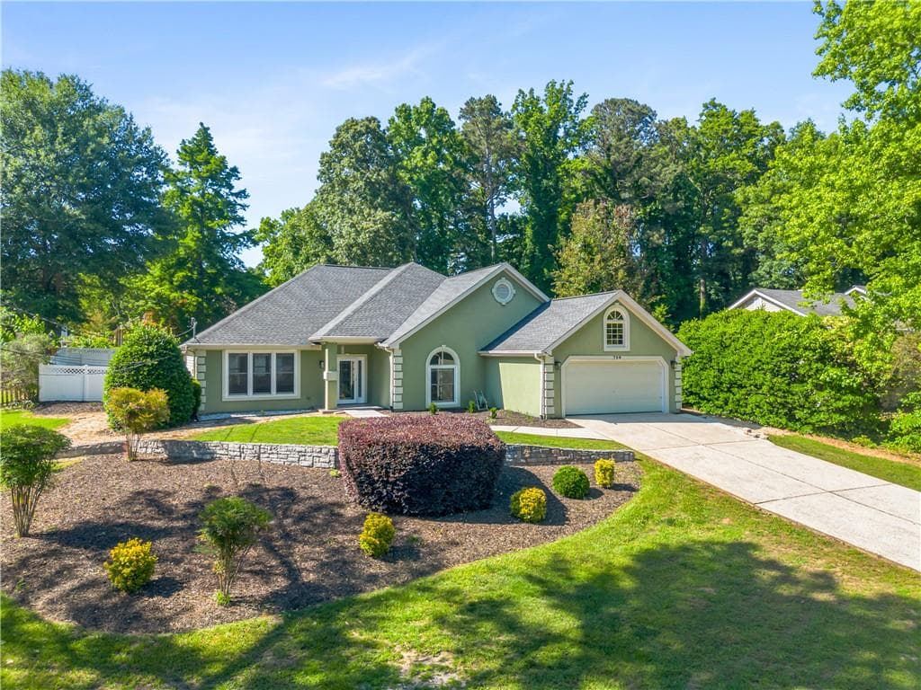 3 bedroom, 2 bathroom, 2,576 sq ft single family residence for sale at 709 Oak Moss Drive, Lawrenceville, GA 30043