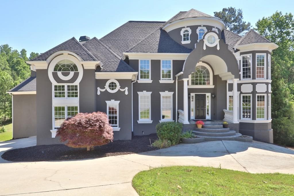 6 bedroom, 6 bathroom, 5,959 sq ft single family residence for sale at 910 Woodward Park Drive, Suwanee, GA 30024