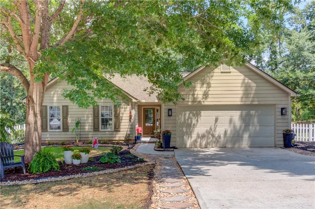 3 bedroom, 2 bathroom, 1,272 sq ft single family residence under contract at 1023 Laurel Green Lane, Sugar Hill, GA 30518